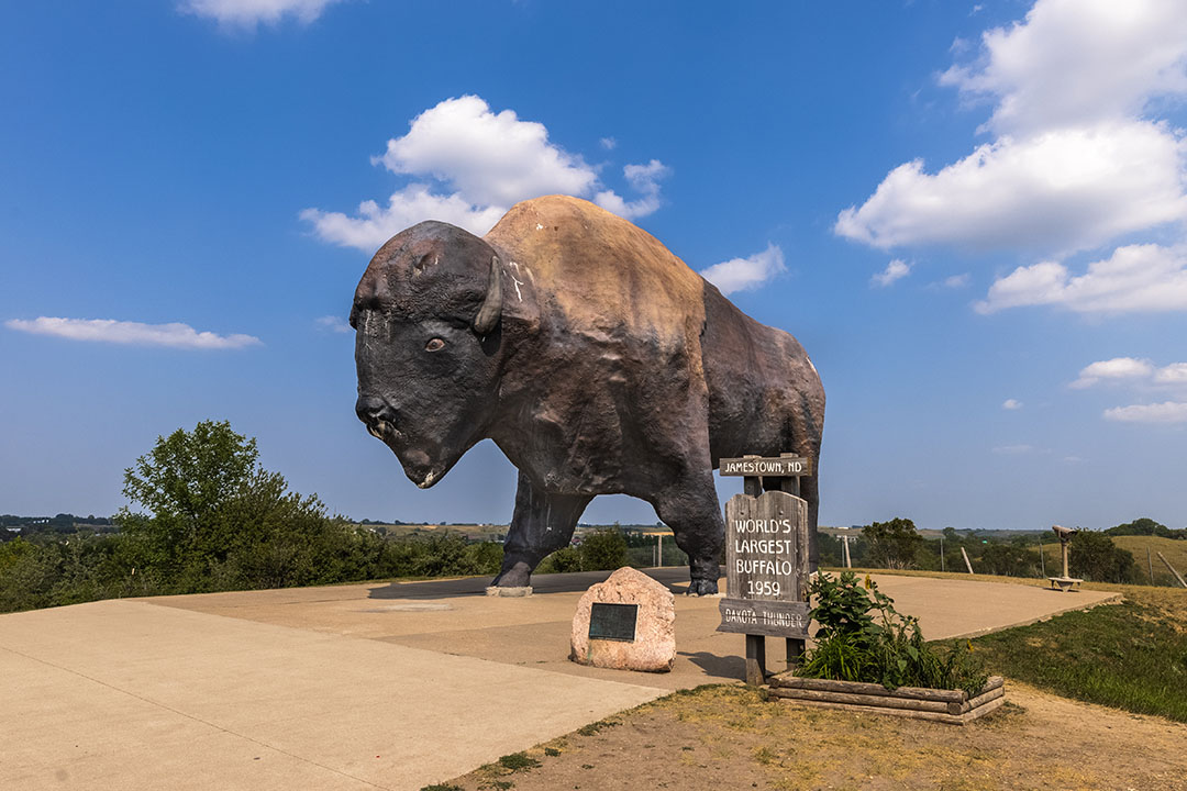 World's largest buffalo monument under blue skies in Jamestown, ND